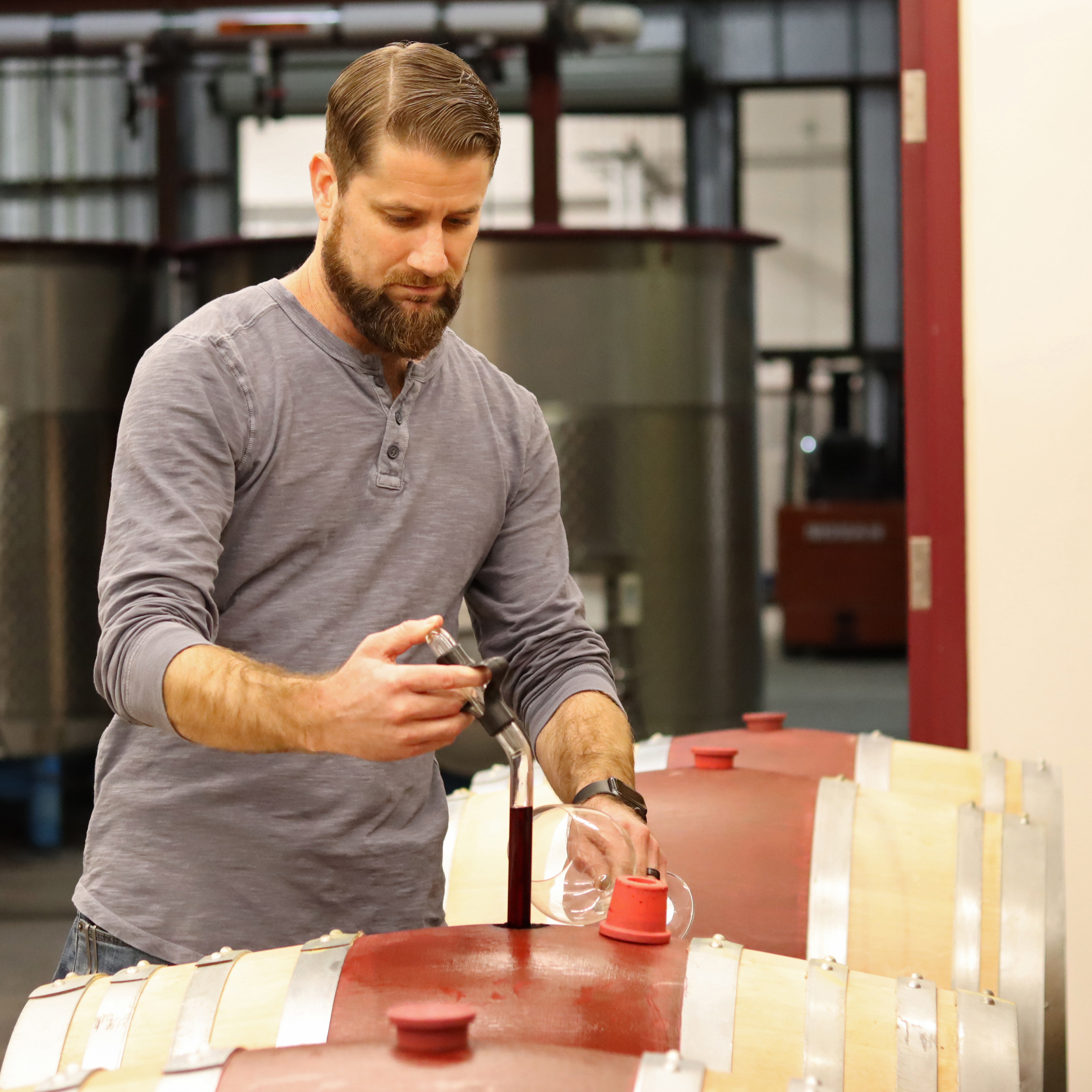 Keith Hammond, Winemaker taking a barrel sample